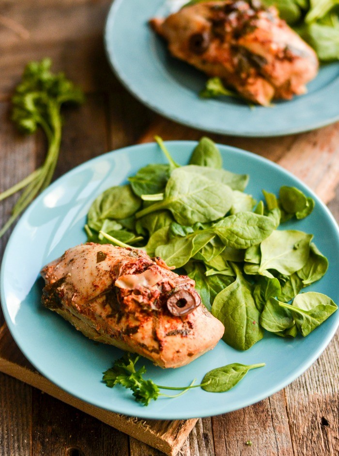 This Crockpot Greek Stuffed Chicken recipe is beautiful, healthy, and full of deliciously complex flavors!