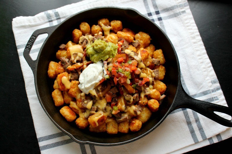 What are Totchos you ask? Totchos are nachos made with tater tots! Skillet Totchos are fun, versatile, and delicious!